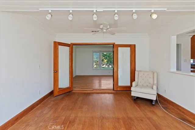 a view of a road with a building in the background