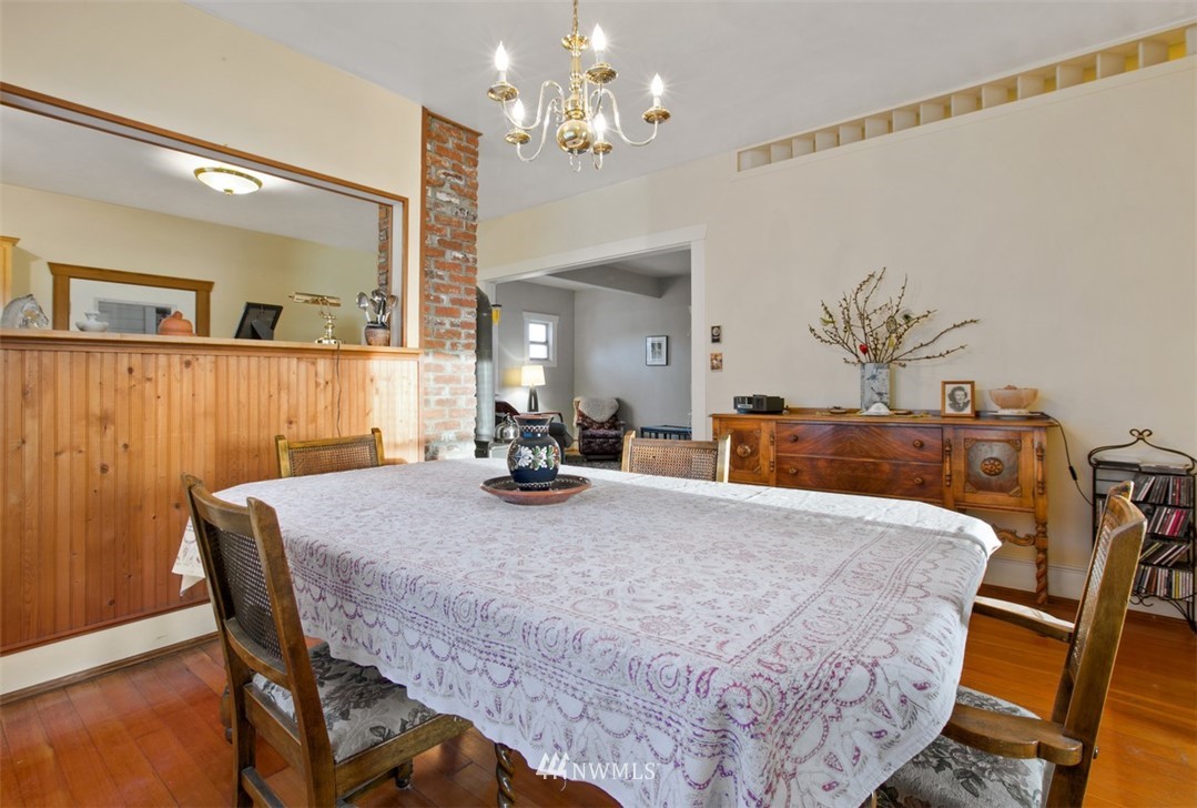 16573 Beaver Marsh Road Mount Vernon, WA 98273 - Photo 15 of 30 a view of a dining room with furniture and wooden floor