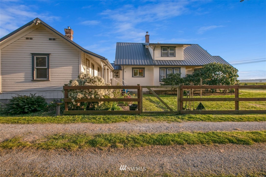 16573 Beaver Marsh Road Mount Vernon, WA 98273 - Photo 5 of 30 a front view of a house with a yard