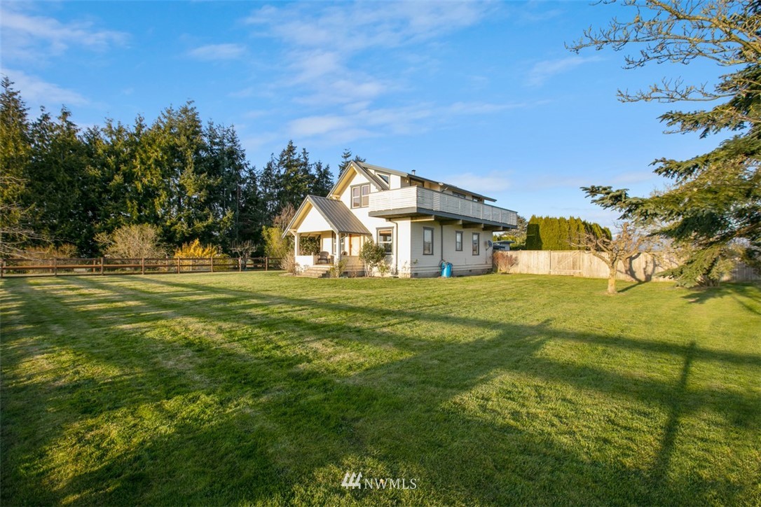 16573 Beaver Marsh Road Mount Vernon, WA 98273 - Photo 6 of 30 a front view of a house with a yard
