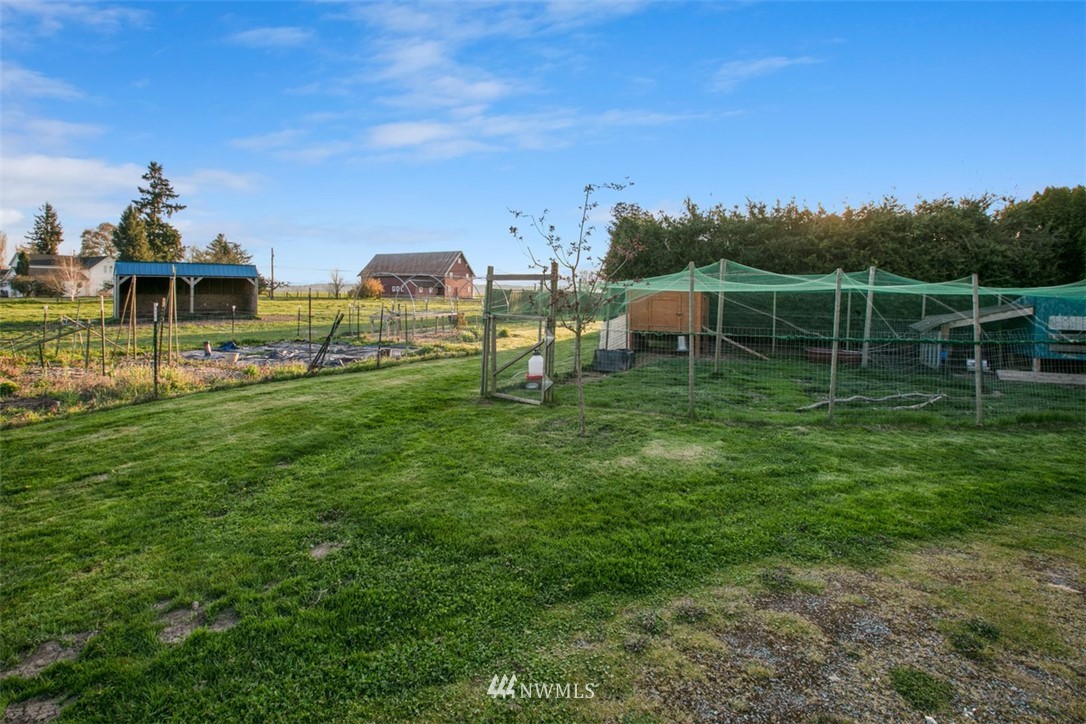 16573 Beaver Marsh Road Mount Vernon, WA 98273 - Photo 10 of 30 a view of a house with a yard