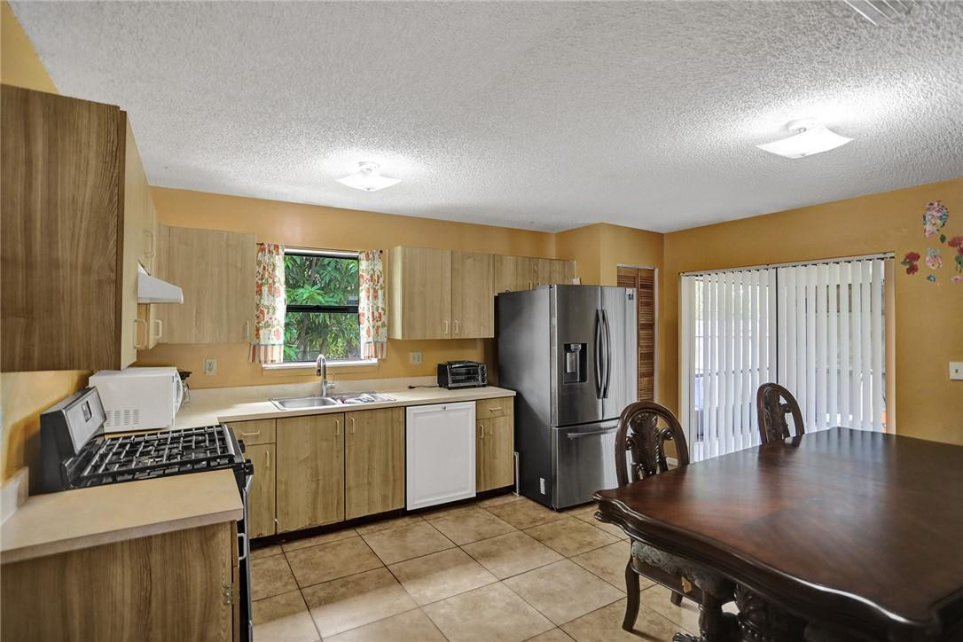 5972 Triphammer Road Lake Worth, FL 33463 - Photo 13 of 26 KITCHEN DINING AREA