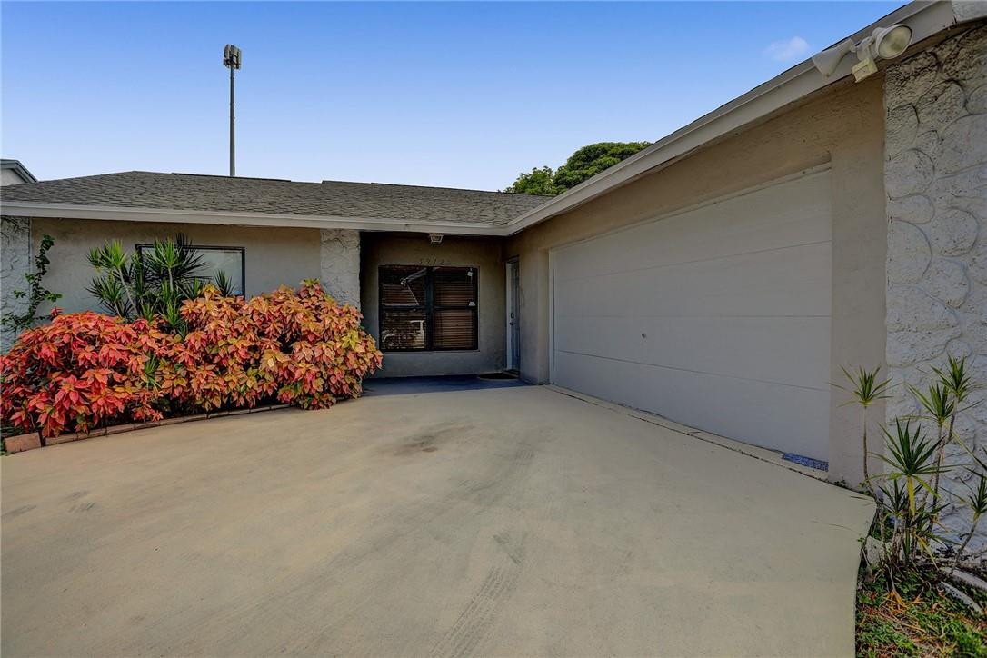 5972 Triphammer Road Lake Worth, FL 33463 - Photo 2 of 26 EXTERIOR FRONT