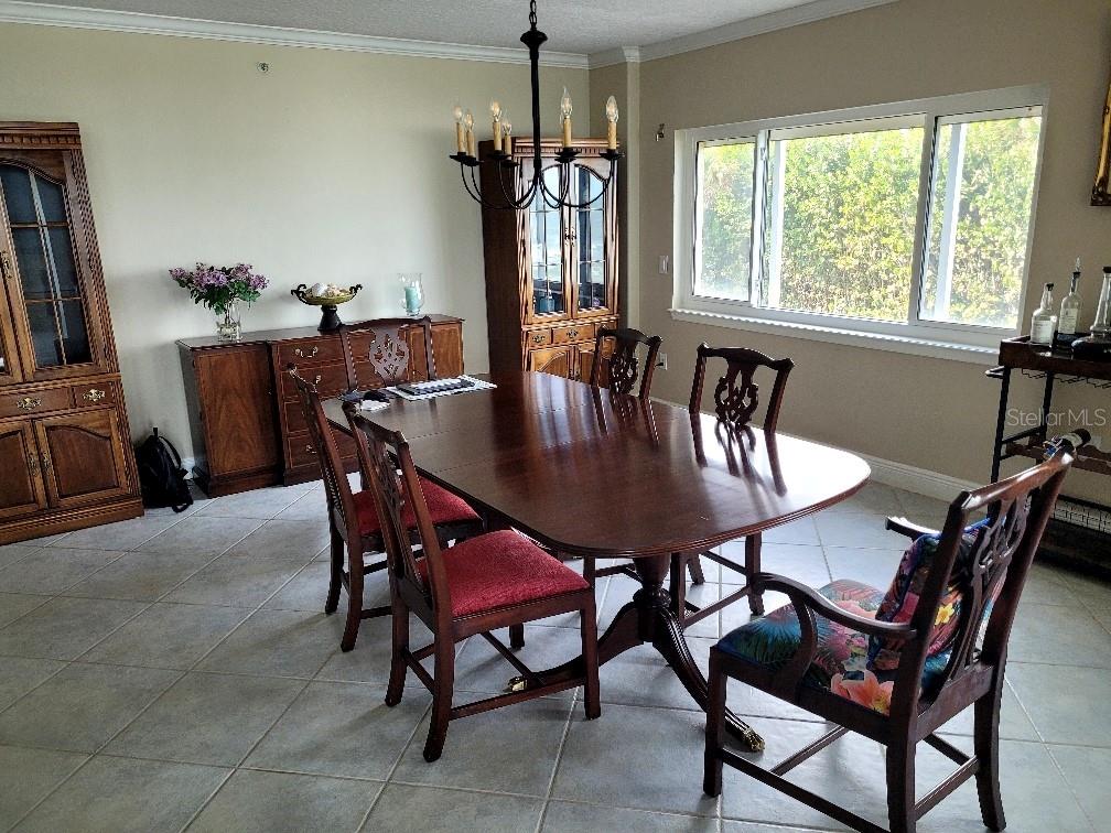 1085 Florida A1A, Unit 1202 Satellite Beach, FL 32937 - Photo 4 of 4 a view of a dining room with furniture window and outside view