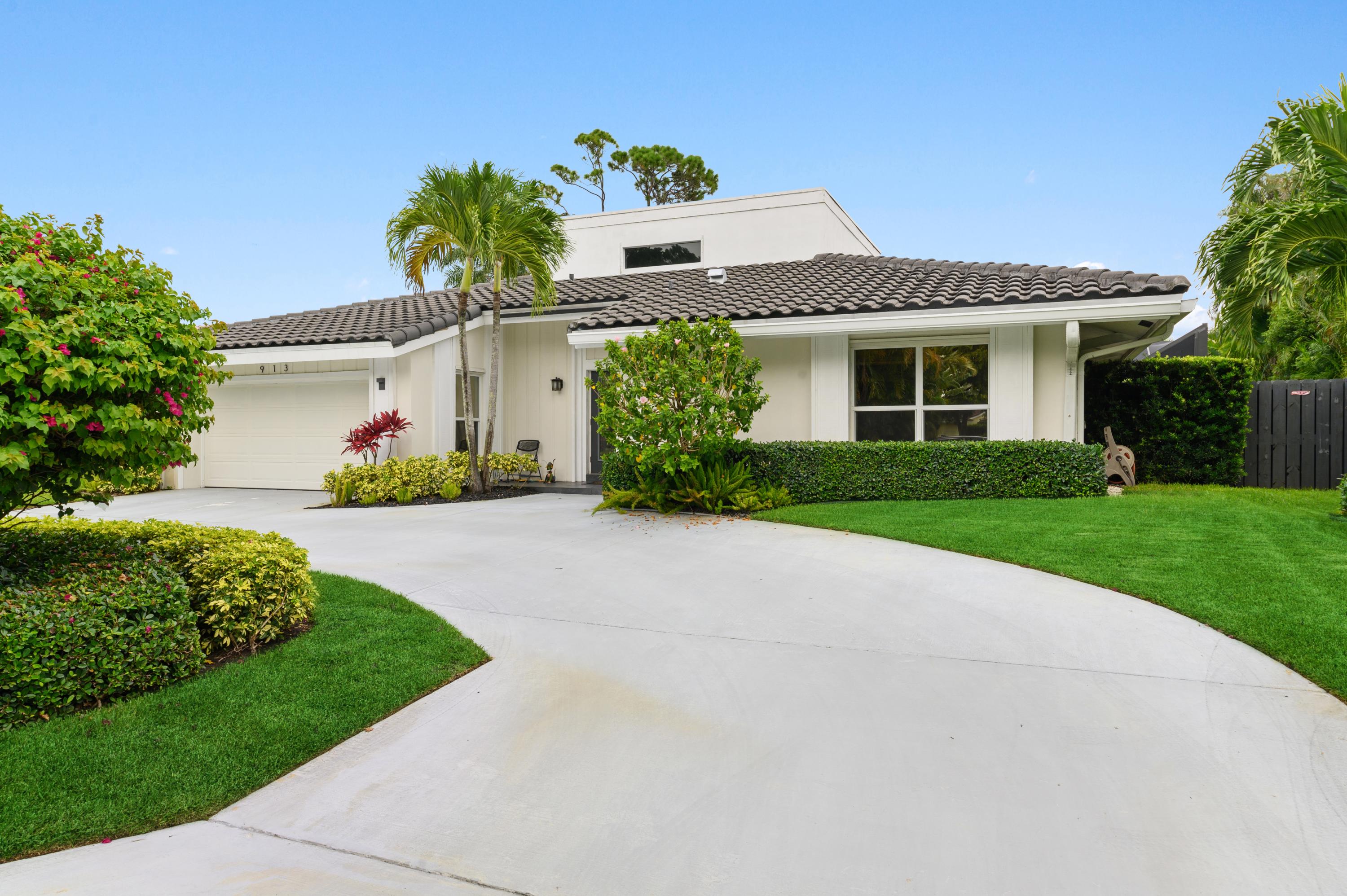913 Foxpointe Circle Delray Beach, FL 33445 - Photo 1 of 21 01_913FoxpointeCircle_57_FrontView_HiRes