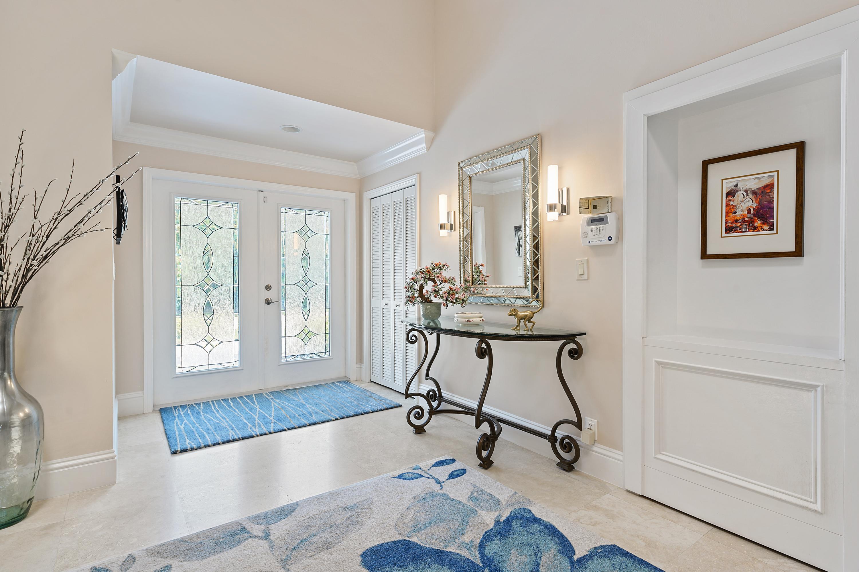 913 Foxpointe Circle Delray Beach, FL 33445 - Photo 2 of 21 02_913FoxpointeCircle_32_Foyer_HiRes