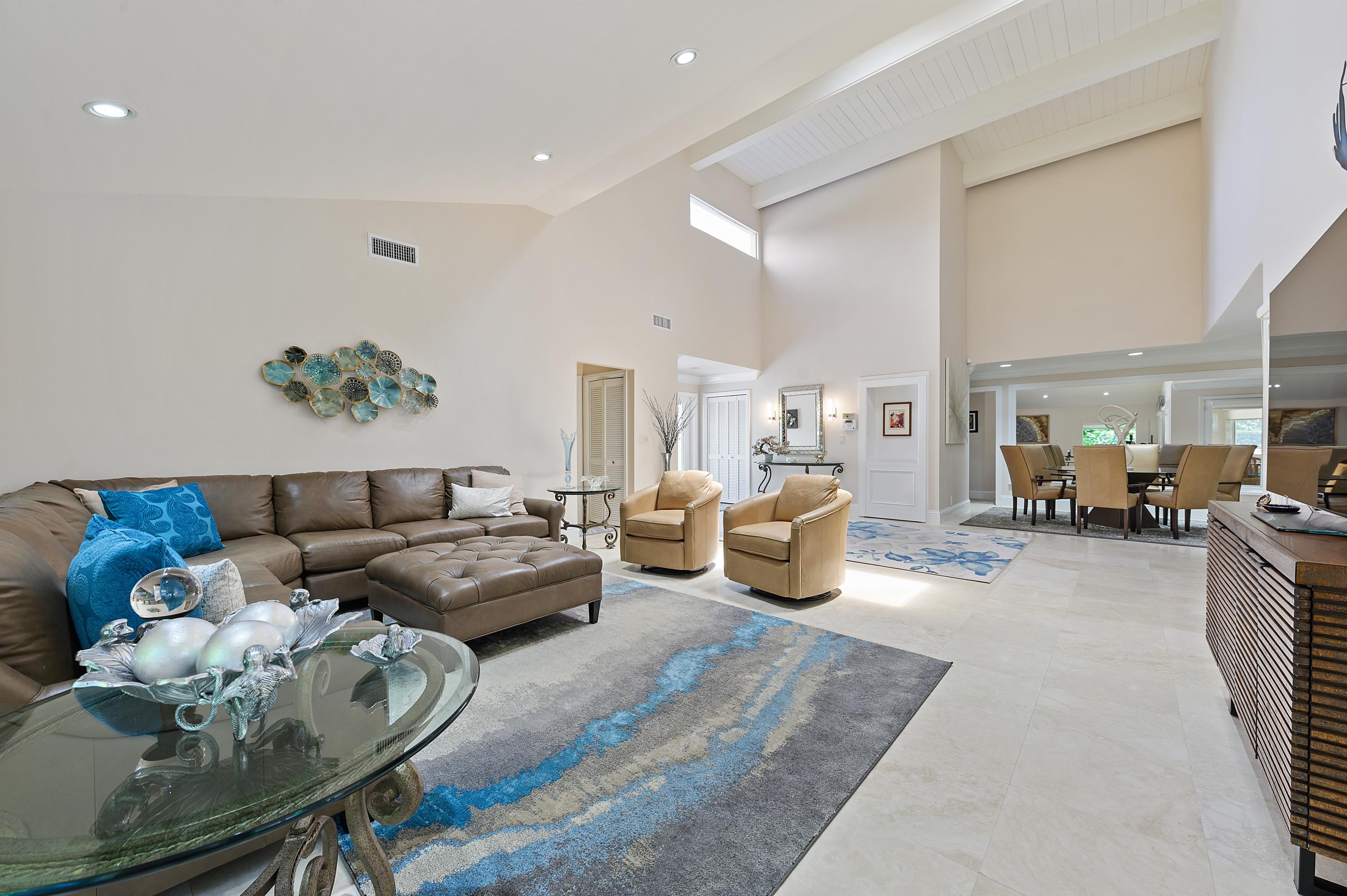 913 Foxpointe Circle Delray Beach, FL 33445 - Photo 3 of 21 03_913FoxpointeCircle_93_LivingRoomDinin