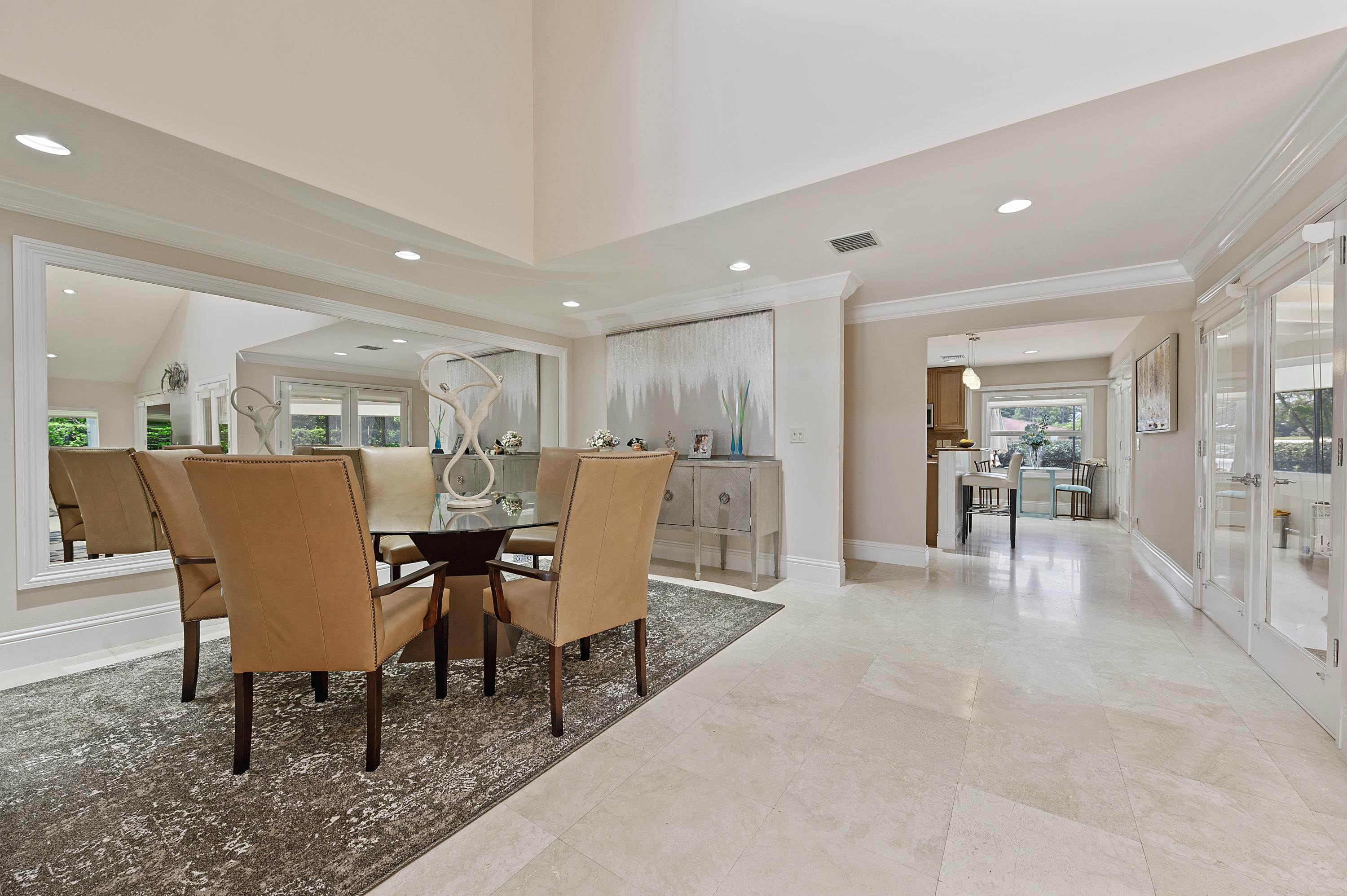 913 Foxpointe Circle Delray Beach, FL 33445 - Photo 4 of 21 04_913FoxpointeCircle_92_KitchenDiningRo