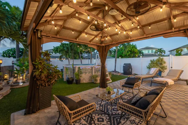 a view of yard with patio