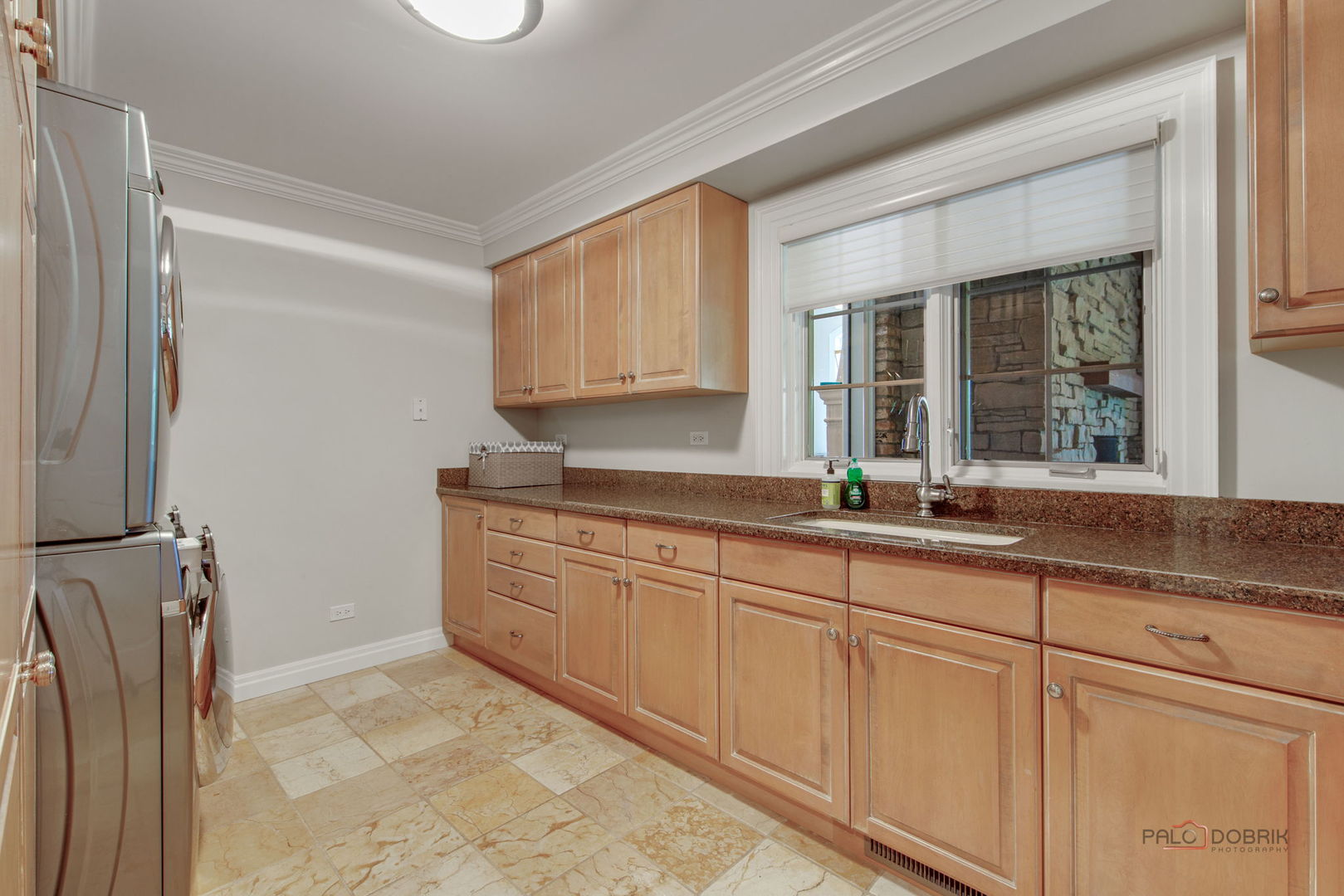 1090 Evergreen Drive Lake Forest, IL 60045 - Photo 27 of 66 a kitchen with granite countertop a sink and a white cabinets