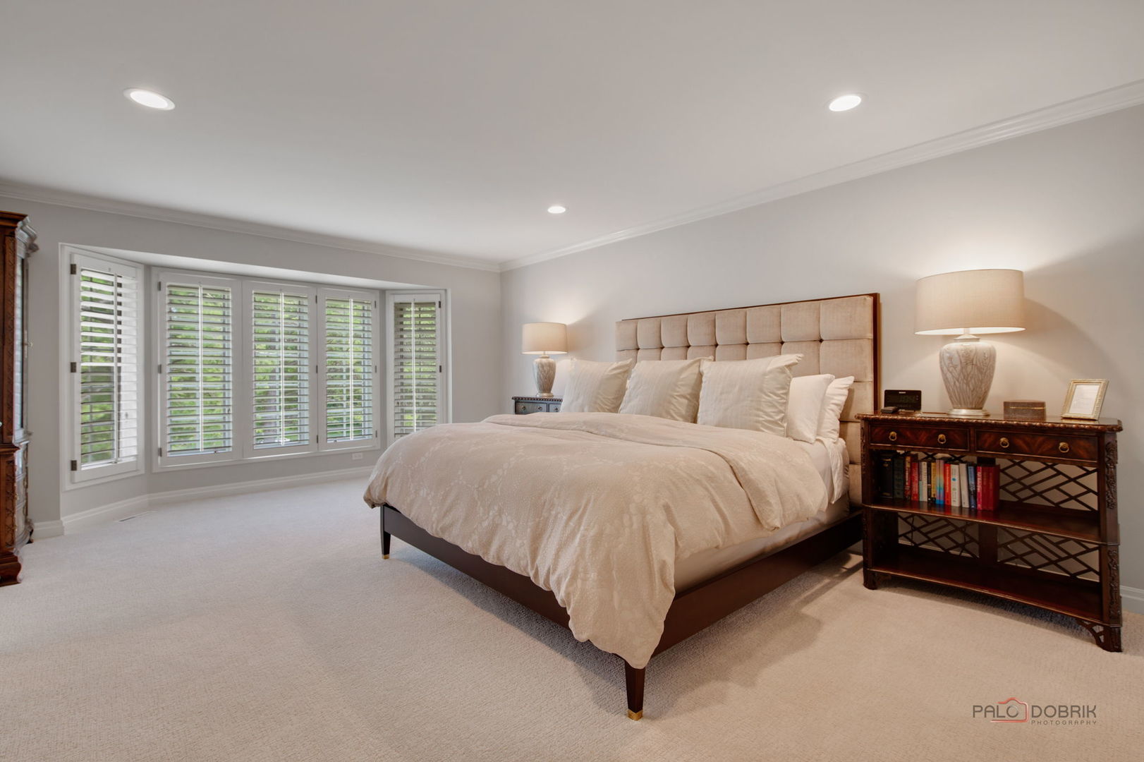 1090 Evergreen Drive Lake Forest, IL 60045 - Photo 31 of 66 a spacious bedroom with a bed and a large window