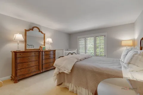 a room with gym equipment and a table