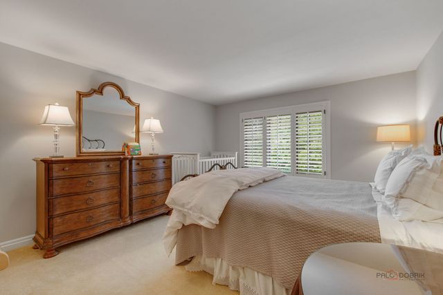 a room with gym equipment and a table