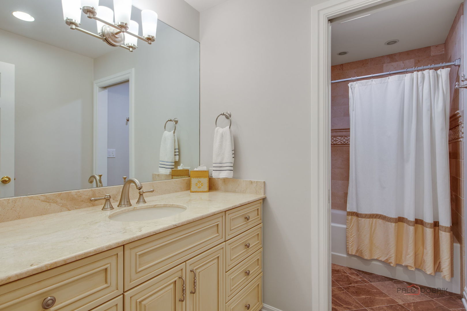1090 Evergreen Drive Lake Forest, IL 60045 - Photo 38 of 66 a bathroom with a double vanity sink and a mirror