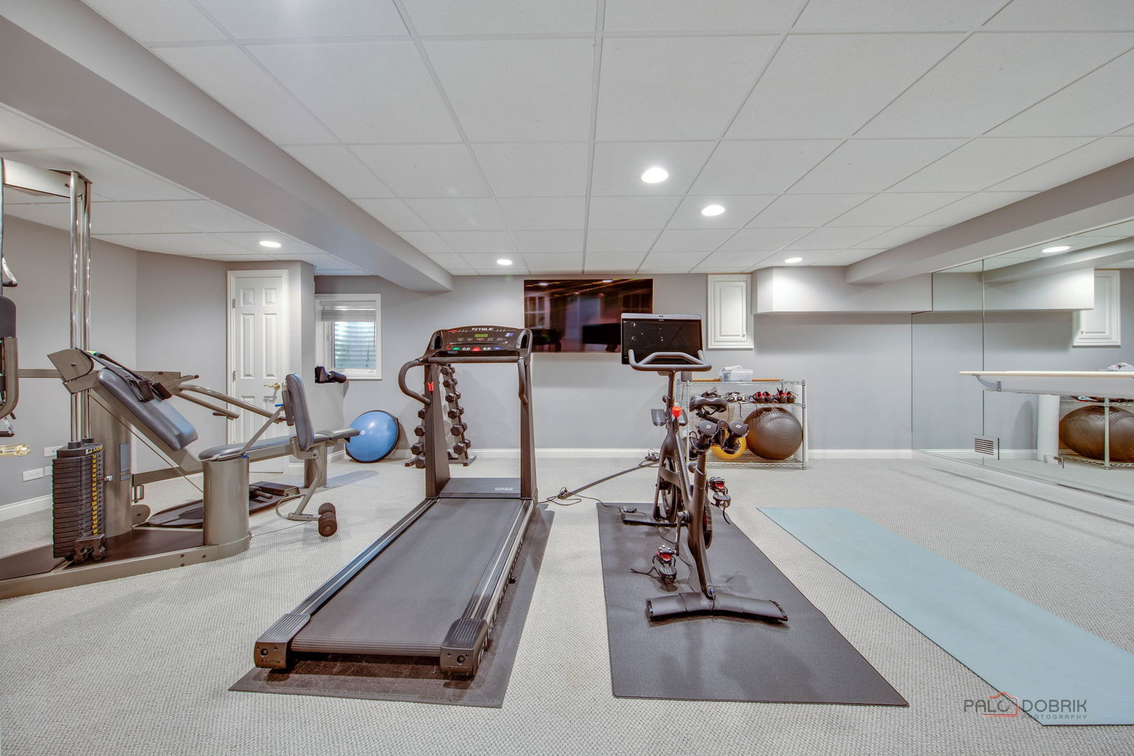 1090 Evergreen Drive Lake Forest, IL 60045 - Photo 44 of 66 a room with gym equipment and a table