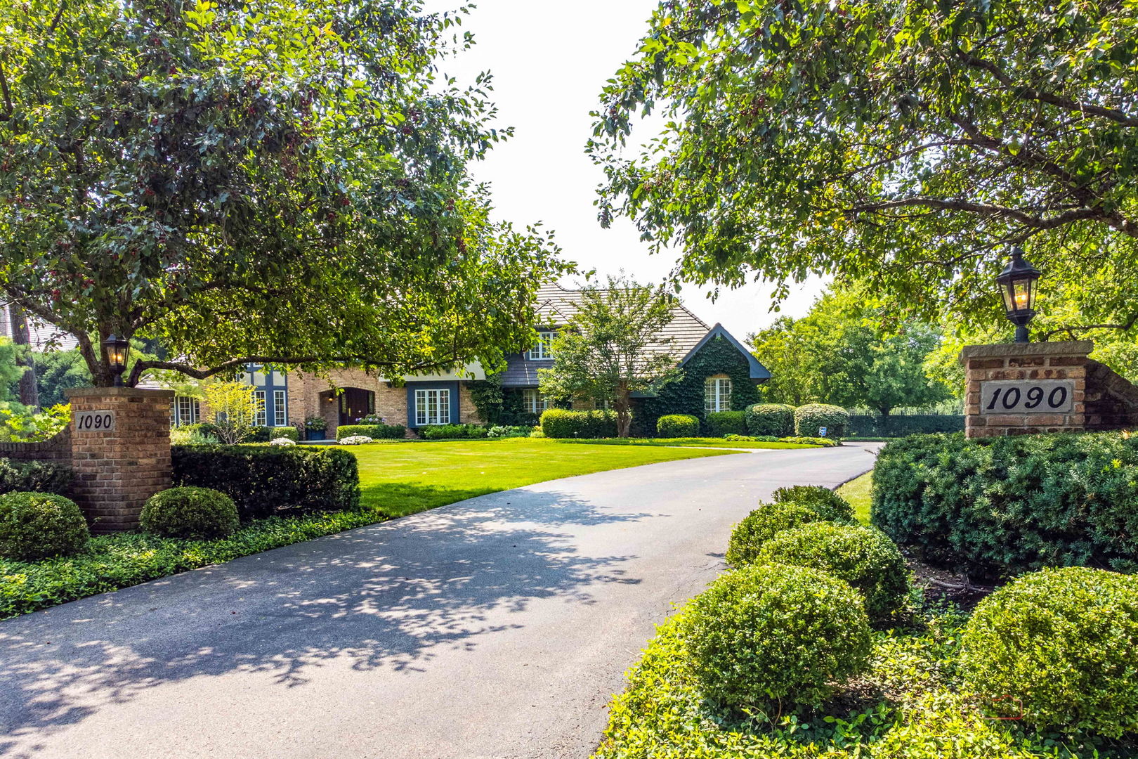 1090 Evergreen Drive Lake Forest, IL 60045 - Photo 60 of 66 a view of a house with swimming pool and a yard