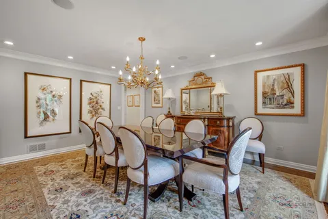 a view of living room with stainless steel appliances granite countertop lots of counter top space