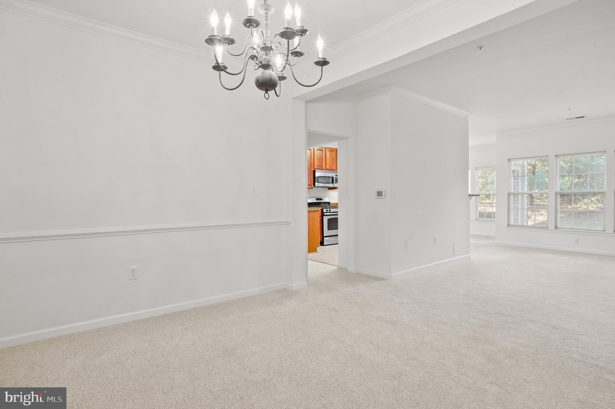 1014 Samantha Lane, Unit 102 Odenton, MD 21113 - Photo 15 of 32 wooden floor in an empty room