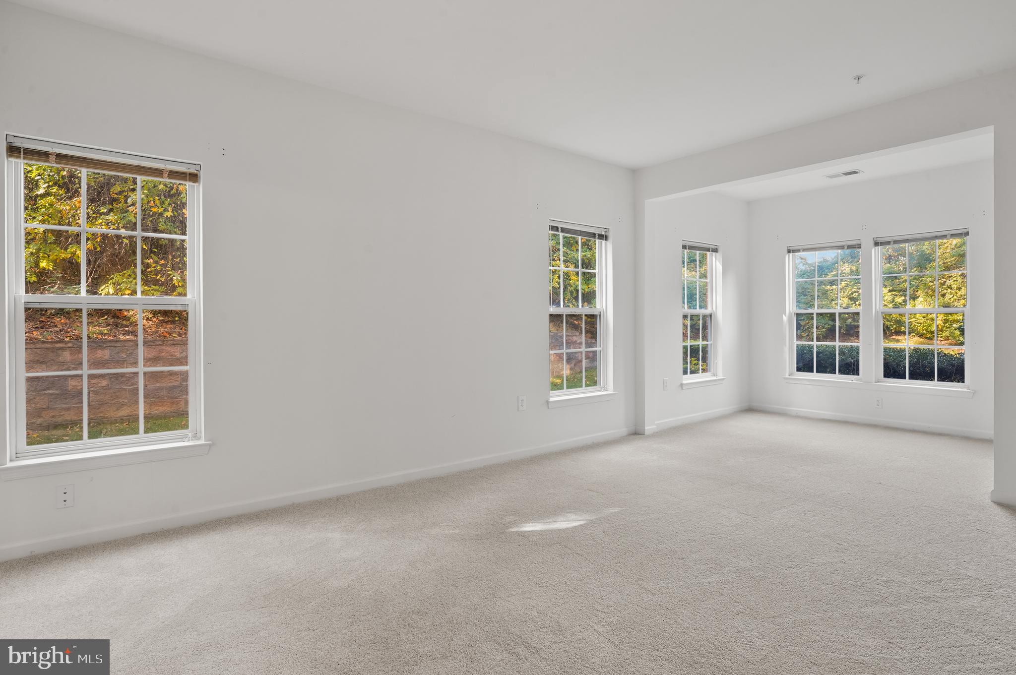 1014 Samantha Lane, Unit 102 Odenton, MD 21113 - Photo 28 of 32 an empty room with windows