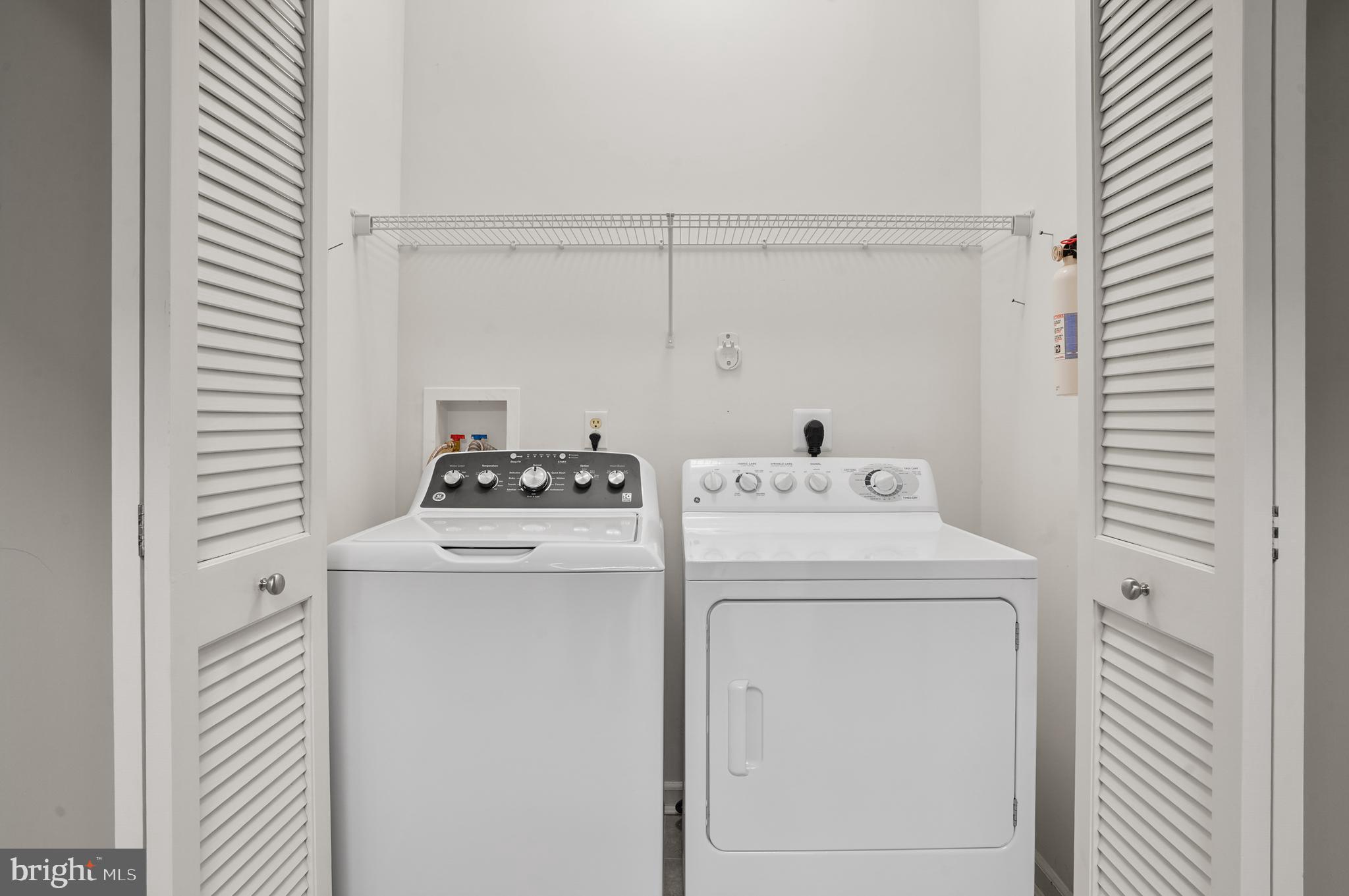 1014 Samantha Lane, Unit 102 Odenton, MD 21113 - Photo 31 of 32 a utility room with dryer and washer
