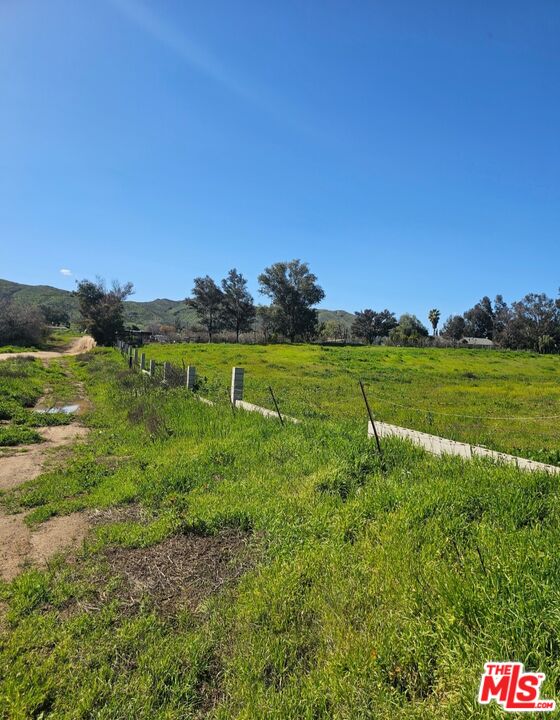 0 Olympia/spring Street Perris, CA 92570 - Photo 2 of 4 a view of a field with an trees