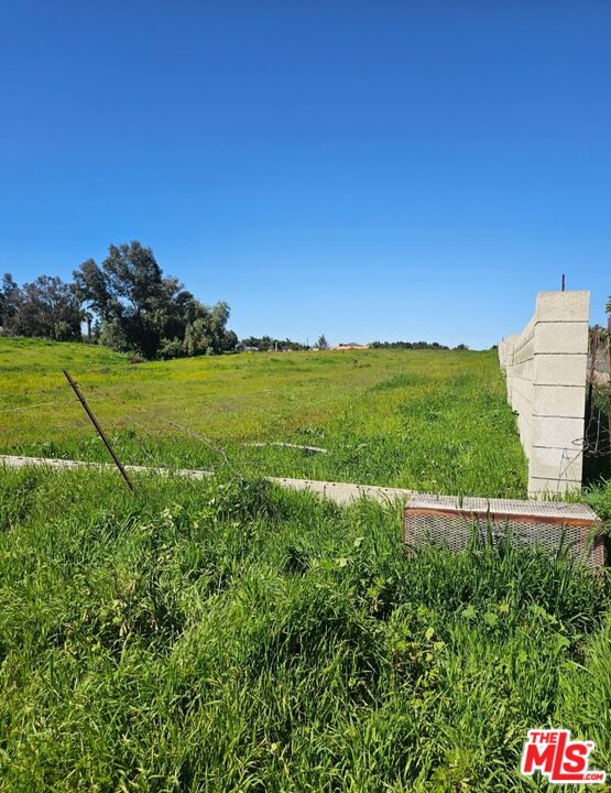 0 Olympia/spring Street Perris, CA 92570 - Photo 4 of 4 a view of an outdoor space and a yard