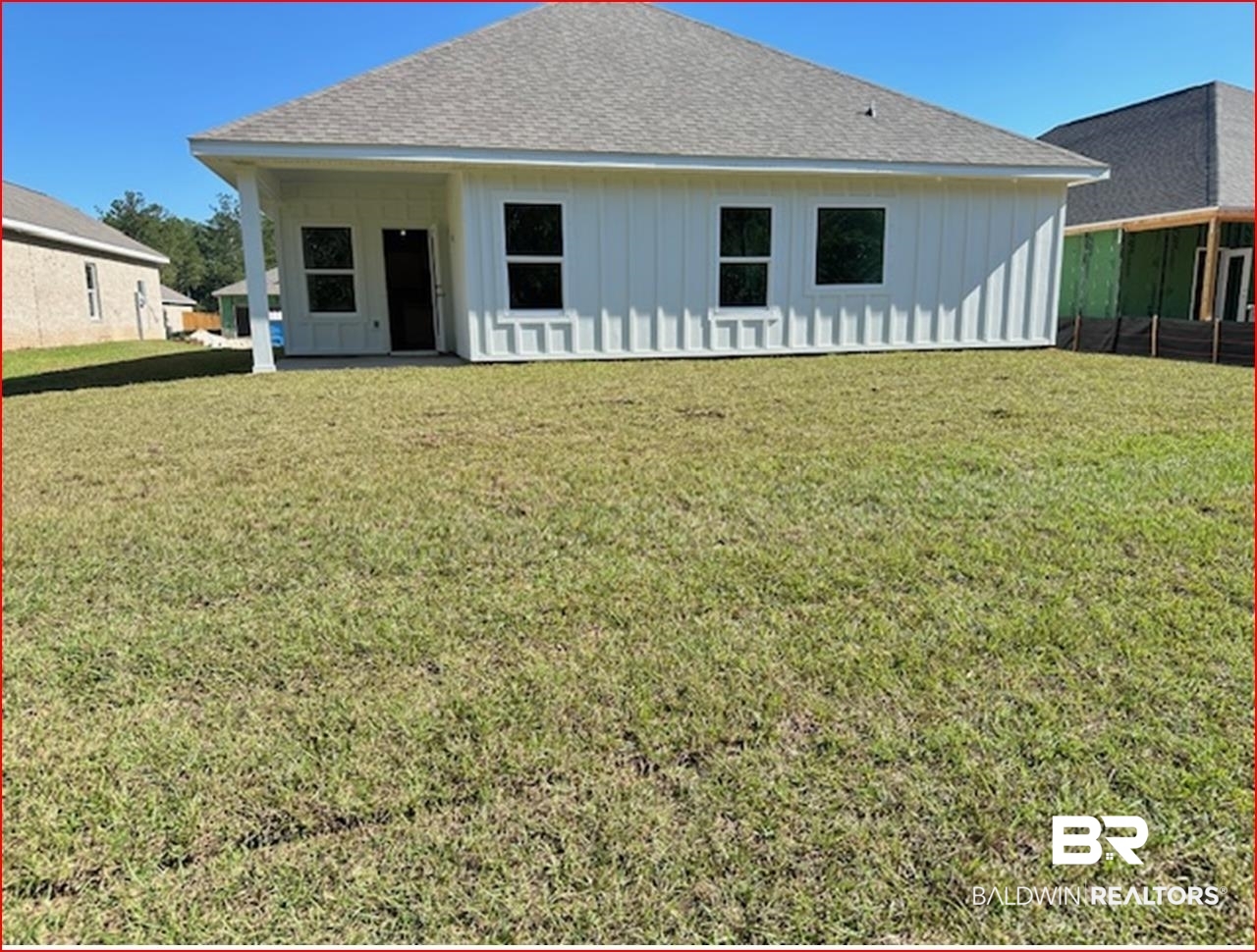 13906 Antler Hl Road Daphne, AL 36527 - Photo 13 of 23 Back of property with a lawn