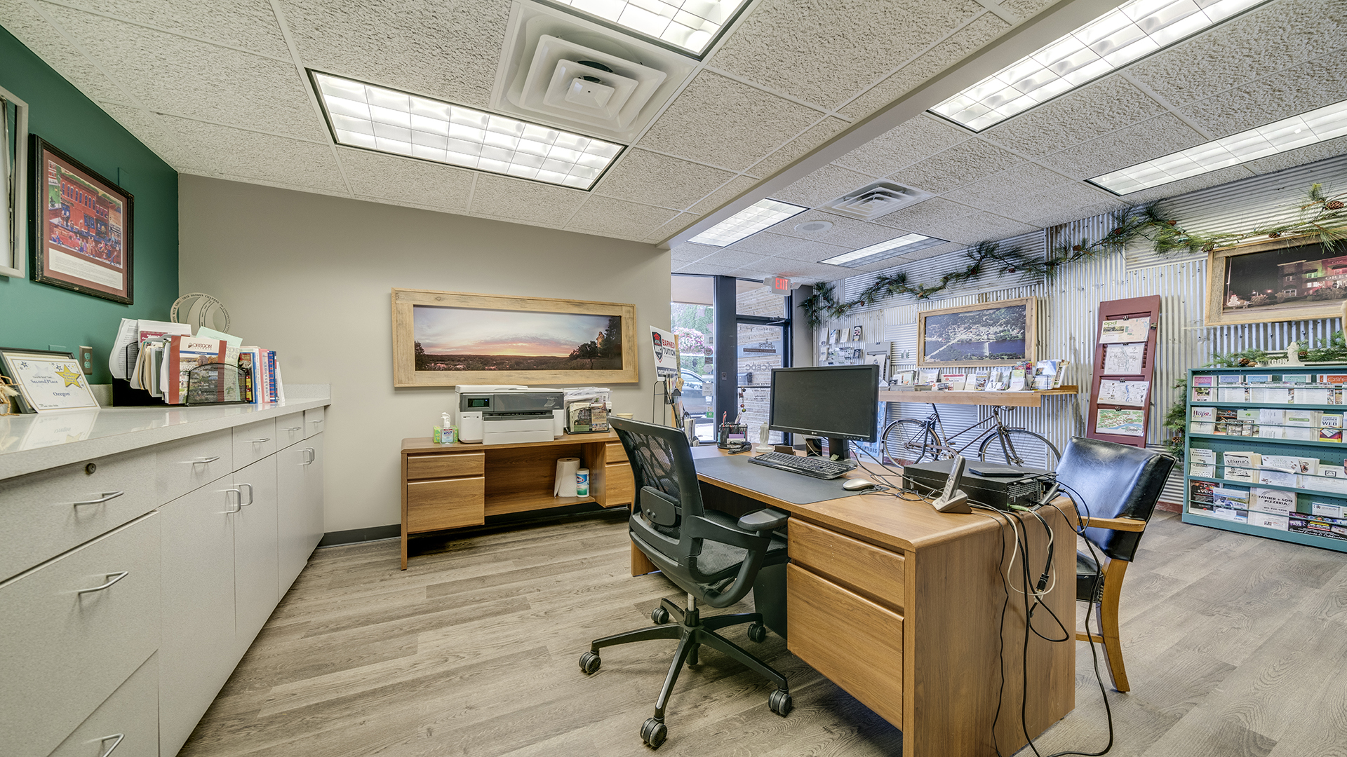122 North 4th Street Oregon, IL 61061 - Photo 12 of 32 a view of a workspace with furniture and a kitchen