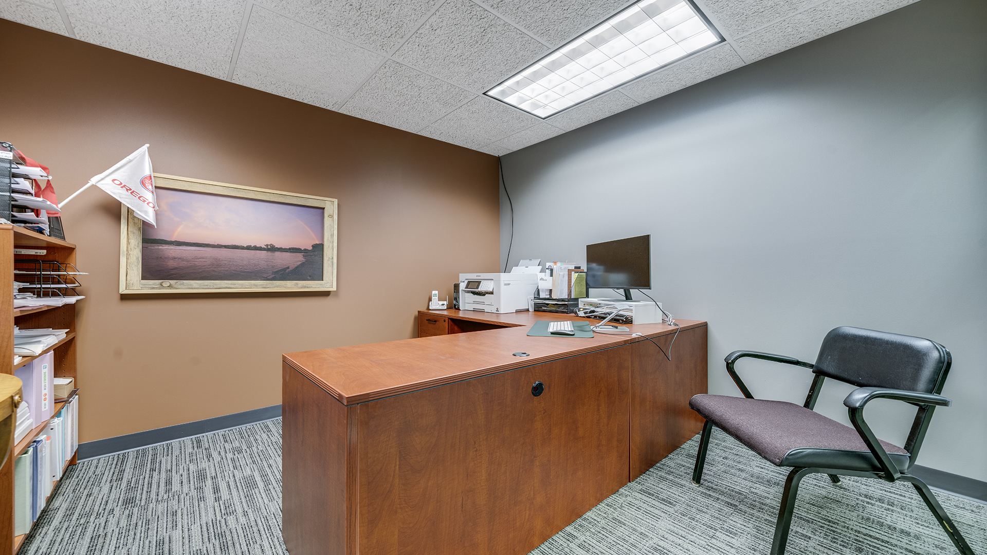 122 North 4th Street Oregon, IL 61061 - Photo 17 of 32 a room with a desk and chair