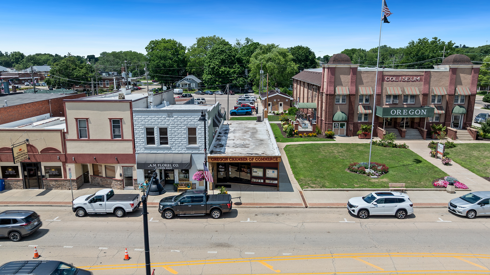 122 North 4th Street Oregon, IL 61061 - Photo 2 of 32 a view of a street with cars parked