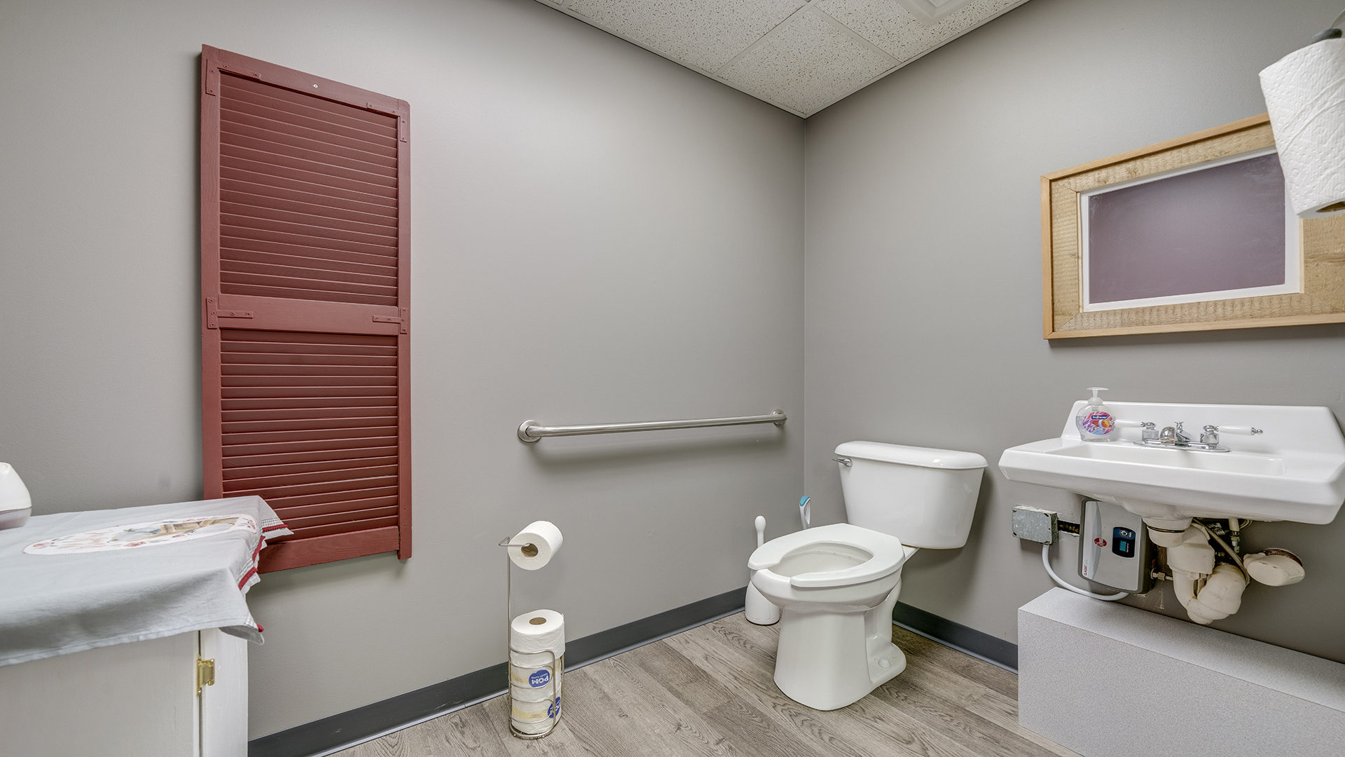 122 North 4th Street Oregon, IL 61061 - Photo 22 of 32 a white toilet sitting next to a bathroom sink