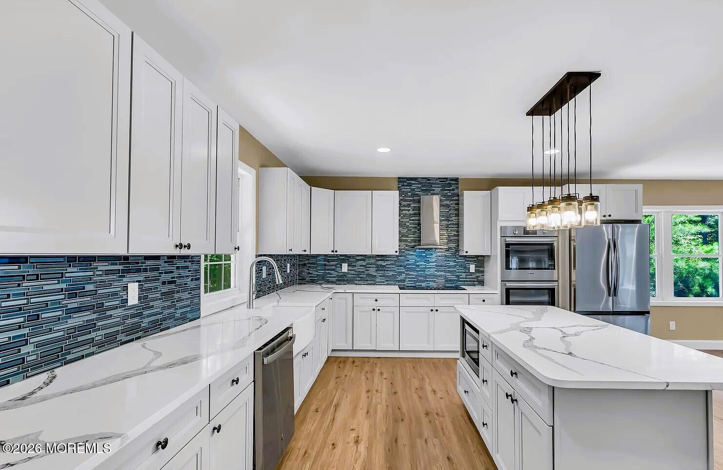 510 Pinehurst Road Cream Ridge, NJ 08514 - Photo 11 of 57 a kitchen with stainless steel appliances granite countertop a sink and cabinets