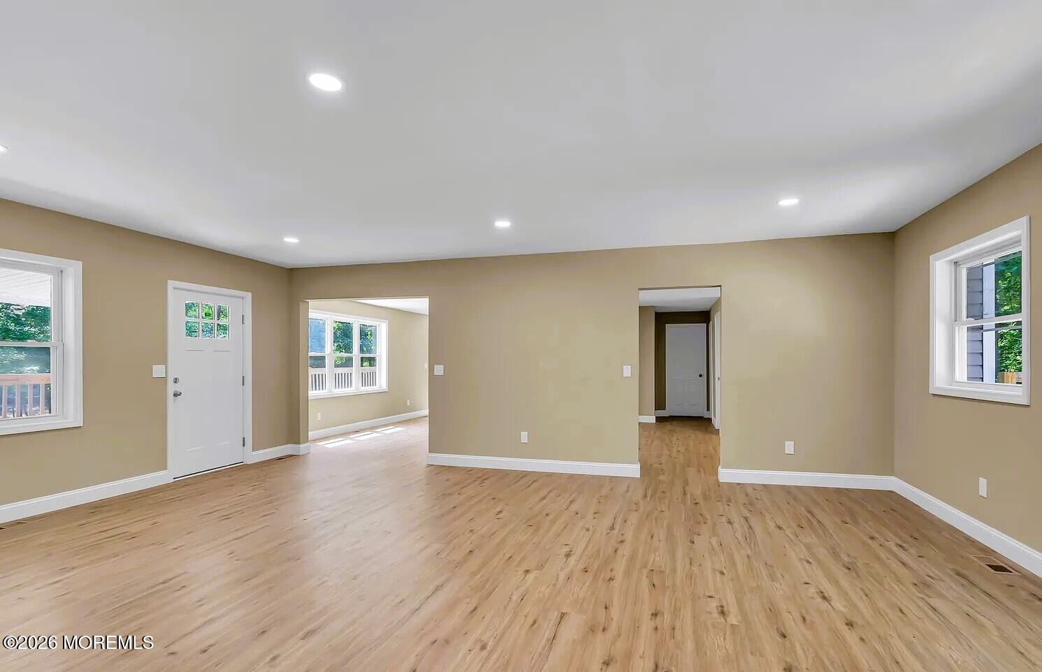 510 Pinehurst Road Cream Ridge, NJ 08514 - Photo 17 of 57 a view of an empty room with wooden floor and a window