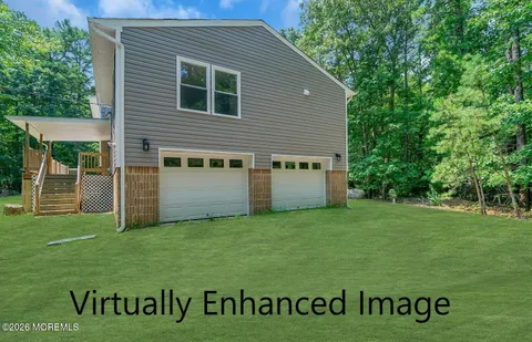 a view of a house with a big yard