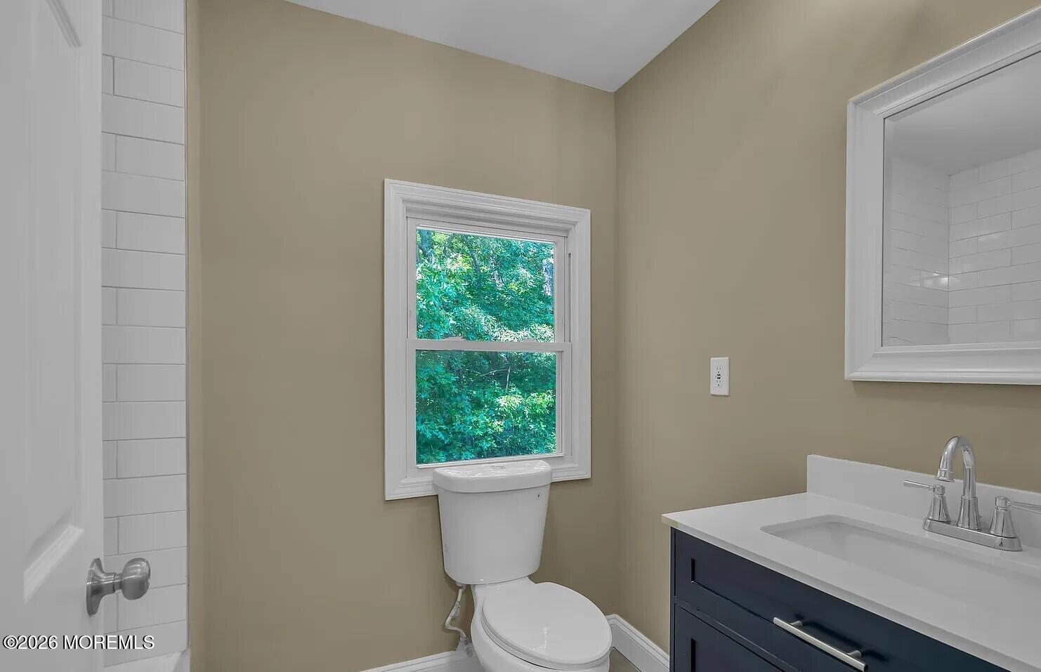 510 Pinehurst Road Cream Ridge, NJ 08514 - Photo 24 of 57 a bathroom with a sink vanity mirror and toilet