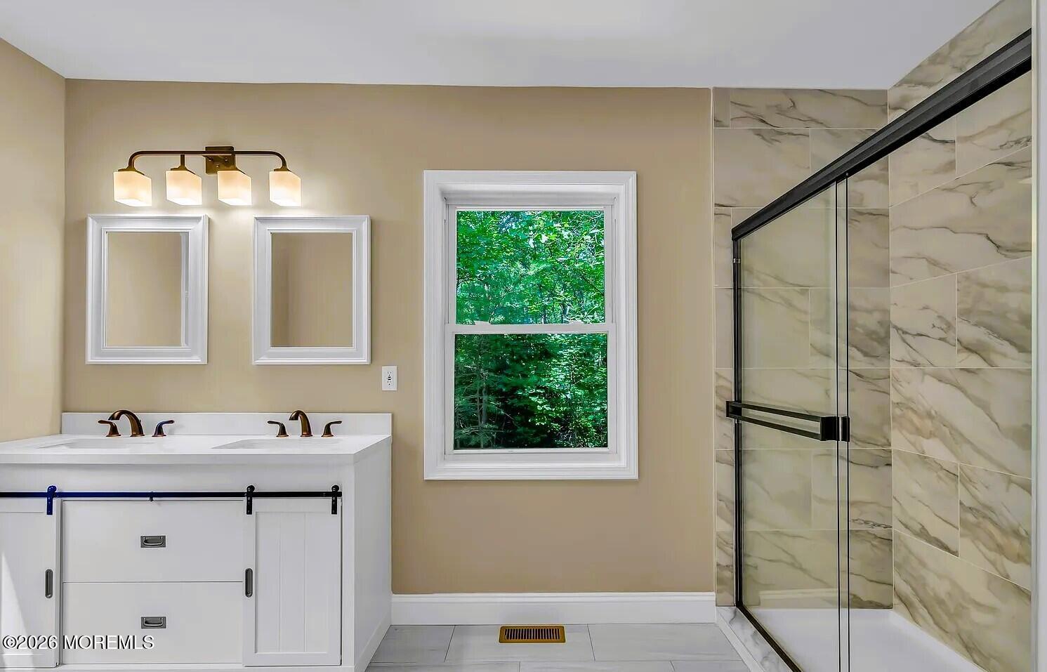 510 Pinehurst Road Cream Ridge, NJ 08514 - Photo 26 of 57 a bathroom with a sink a vanity and a mirror