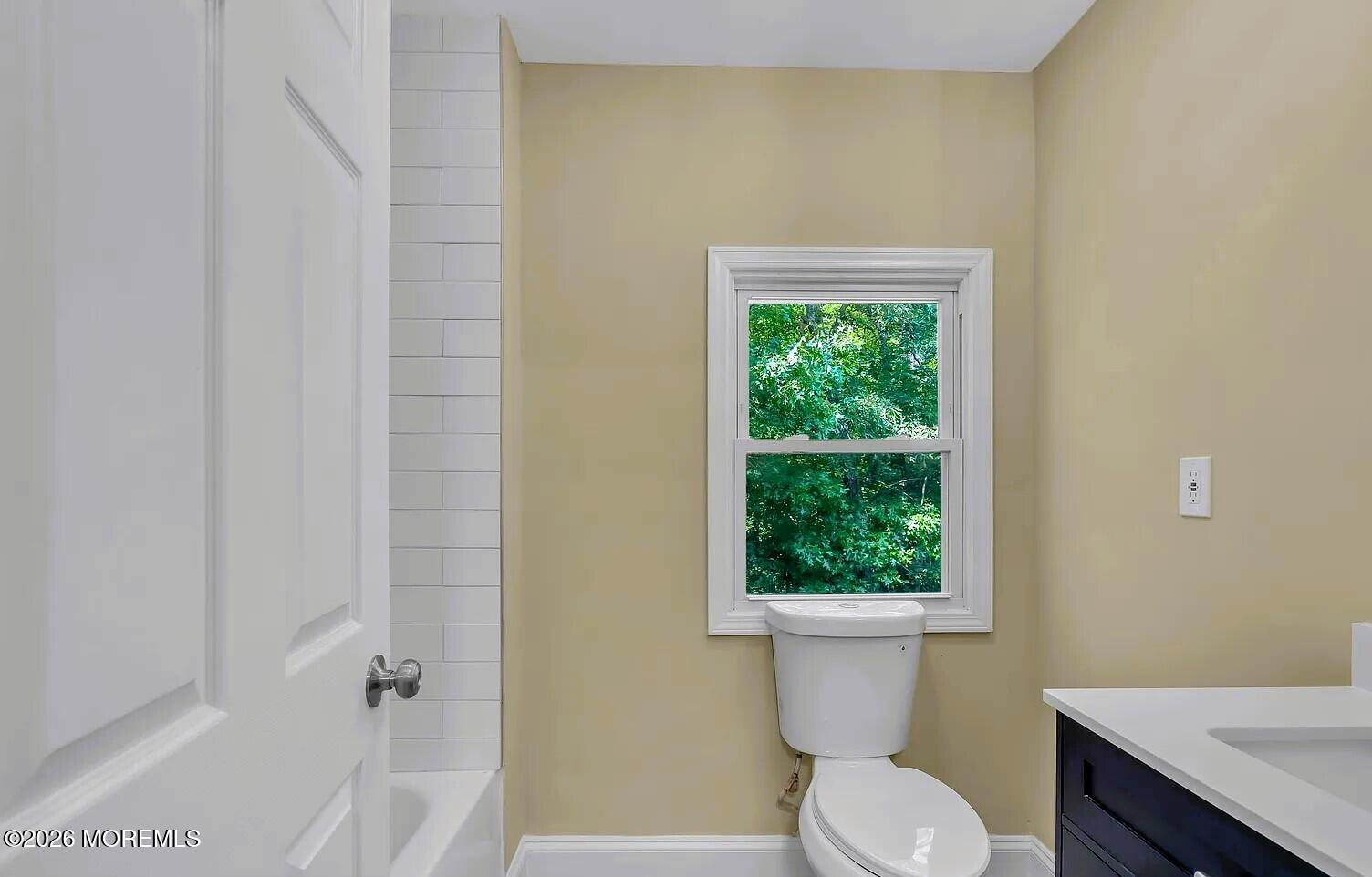 510 Pinehurst Road Cream Ridge, NJ 08514 - Photo 28 of 57 a bathroom with a toilet a sink and a window