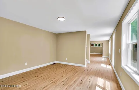 a view of entryway with wooden floor