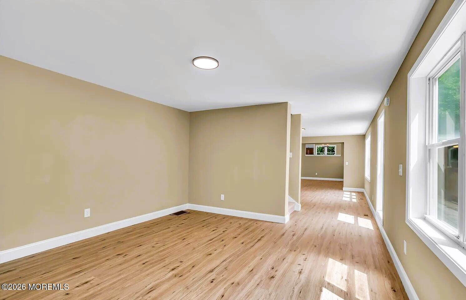 510 Pinehurst Road Cream Ridge, NJ 08514 - Photo 33 of 57 a view of empty room with wooden floor and fan