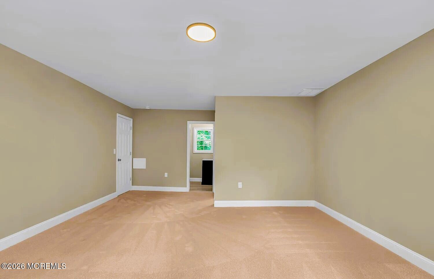 510 Pinehurst Road Cream Ridge, NJ 08514 - Photo 42 of 57 a view of an empty room with a window