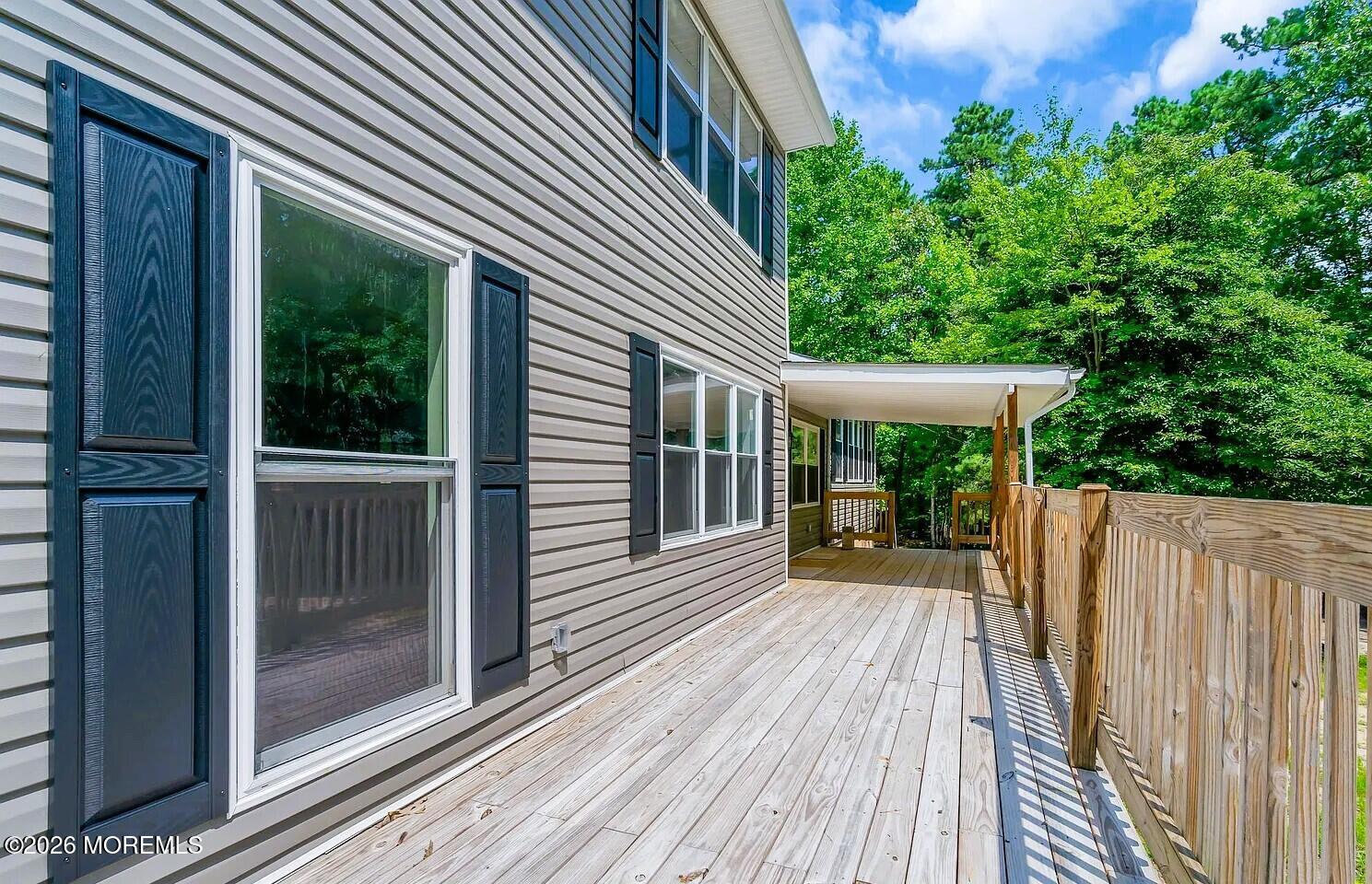 510 Pinehurst Road Cream Ridge, NJ 08514 - Photo 46 of 57 a view of house with backyard outdoor seating and wooden floor