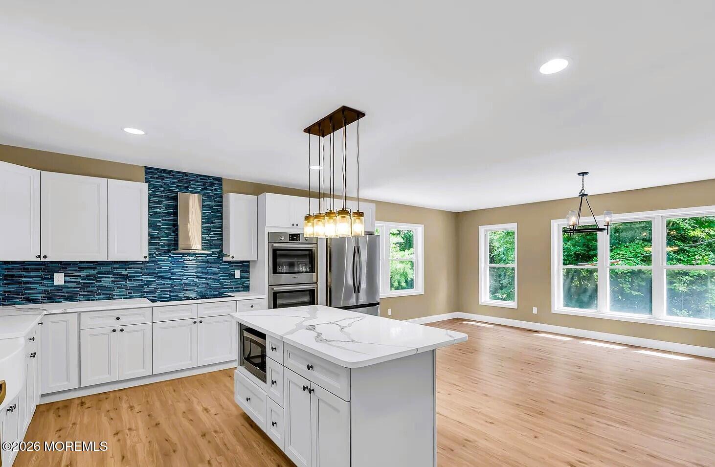 510 Pinehurst Road Cream Ridge, NJ 08514 - Photo 7 of 57 a kitchen with granite countertop a stove and a sink
