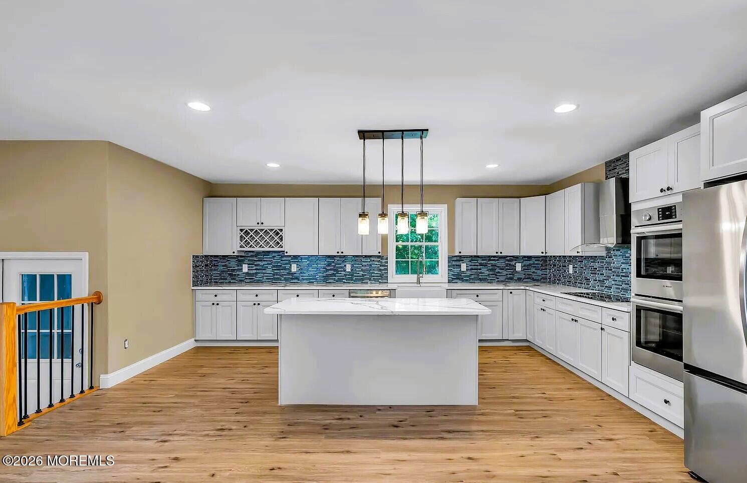 510 Pinehurst Road Cream Ridge, NJ 08514 - Photo 8 of 57 a kitchen with stainless steel appliances granite countertop a sink stove and refrigerator