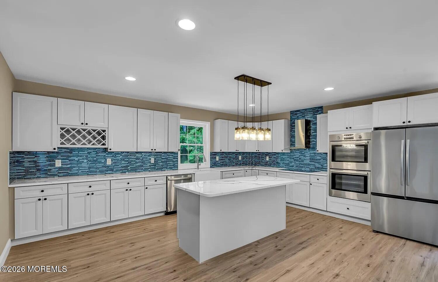 510 Pinehurst Road Cream Ridge, NJ 08514 - Photo 10 of 57 a kitchen with stainless steel appliances granite countertop a sink stove and refrigerator