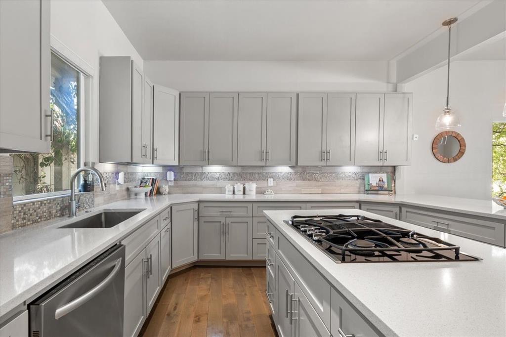 6121 Sharon Road Fort Worth, TX 76116 - Photo 17 of 37 a kitchen with a sink stove and cabinets