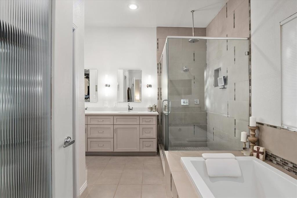 6121 Sharon Road Fort Worth, TX 76116 - Photo 24 of 37 a bathroom with a granite countertop sink a toilet and shower