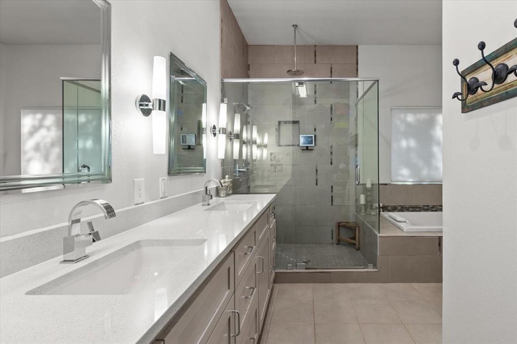 6121 Sharon Road Fort Worth, TX 76116 - Photo 25 of 37 a bathroom with a double vanity sink mirror and shower