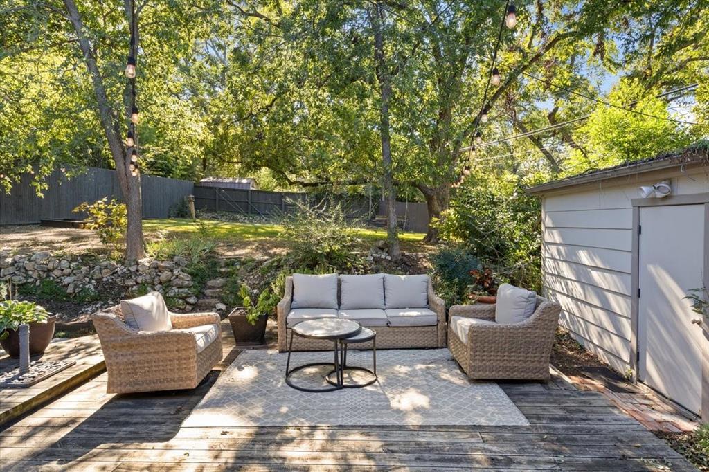 6121 Sharon Road Fort Worth, TX 76116 - Photo 30 of 37 a outdoor living space with furniture and a potted plant