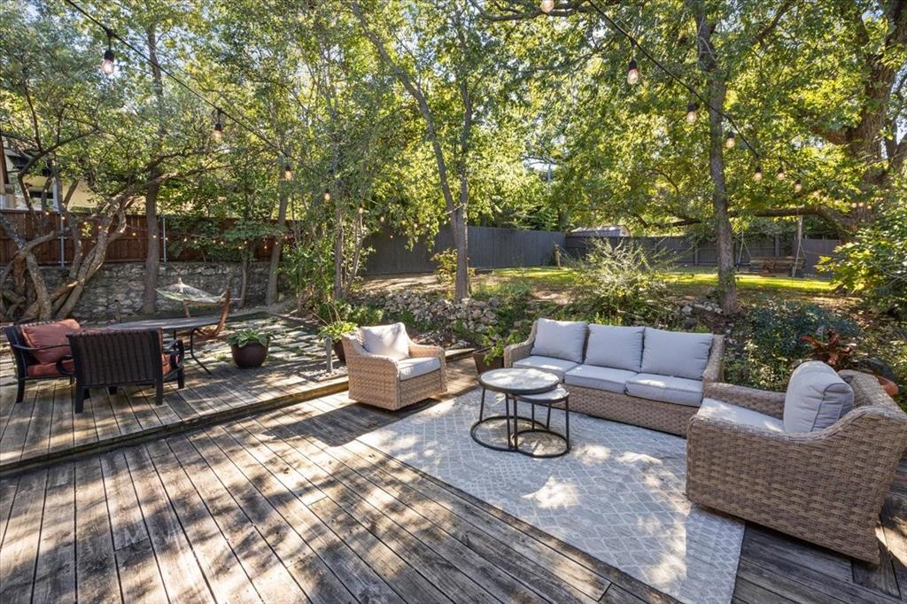 6121 Sharon Road Fort Worth, TX 76116 - Photo 33 of 37 a outdoor living space with patio furniture and a potted plant