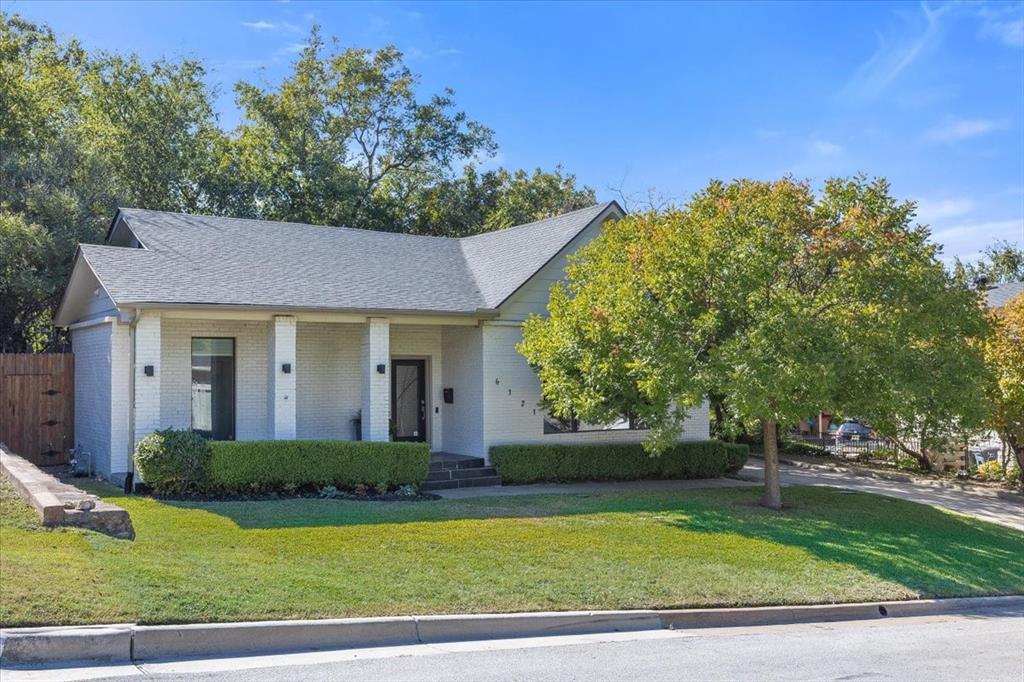 6121 Sharon Road Fort Worth, TX 76116 - Photo 4 of 37 a view of a house with a swimming pool